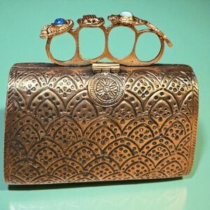 From St. Xavier Ornate Gold Clutch with Unique Handle